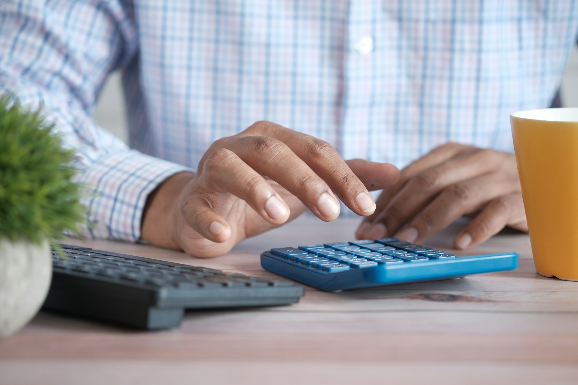 Person calculating finances
